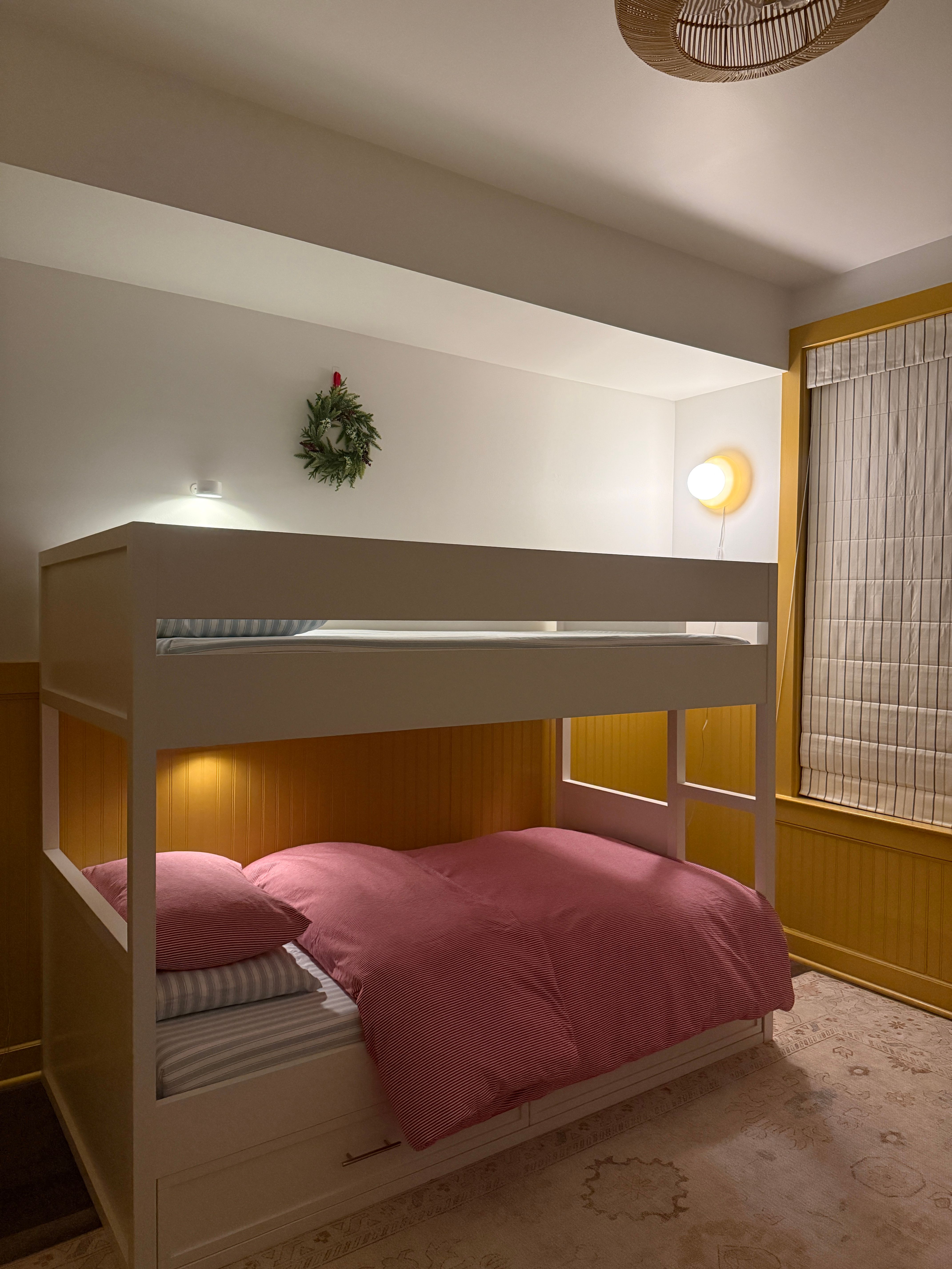 Little Boy Room with yellow beadboard panelling and bunk bed designed by Pragya Saikia Design in Herndon, Virginia