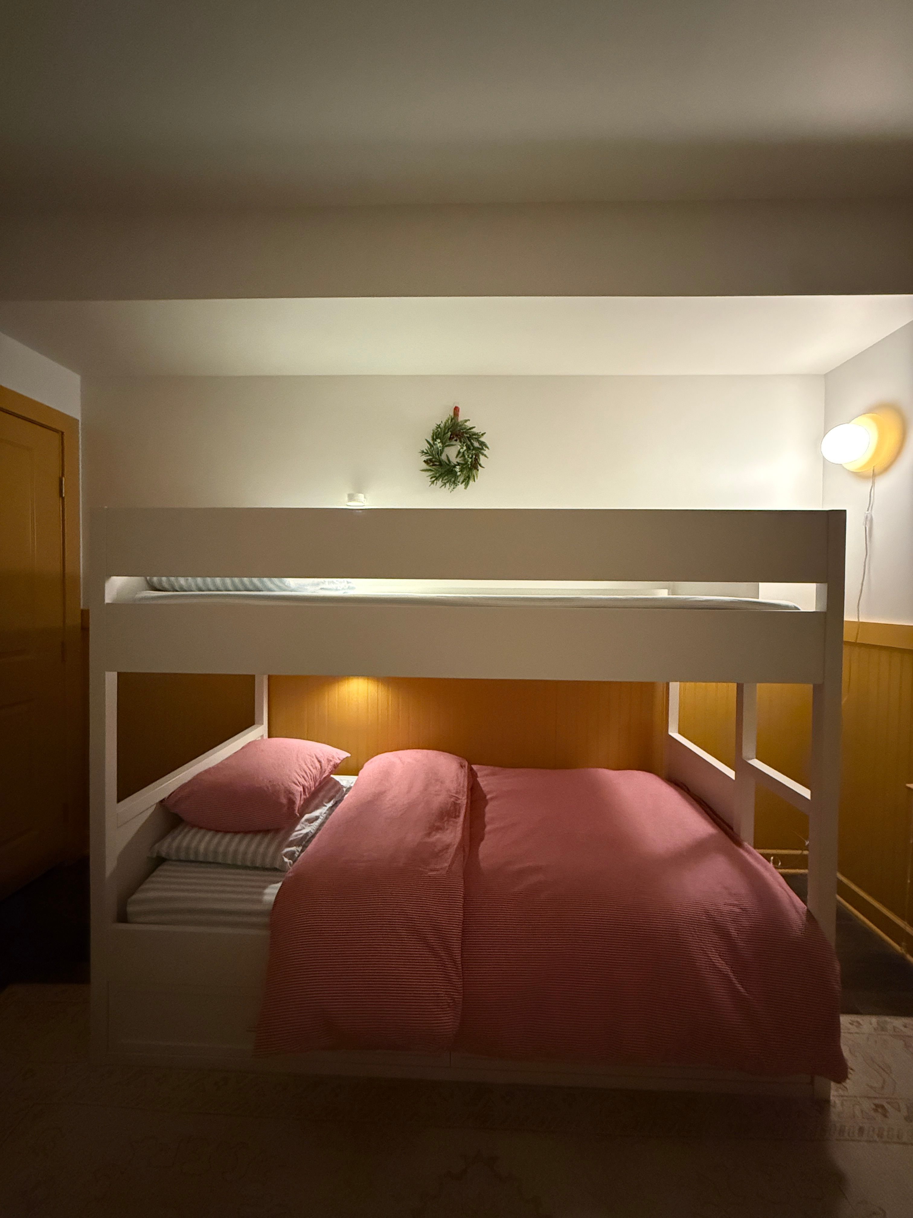 Little Boy Room with yellow beadboard panelling and bunk bed designed by Pragya Saikia Design in Herndon, Virginia