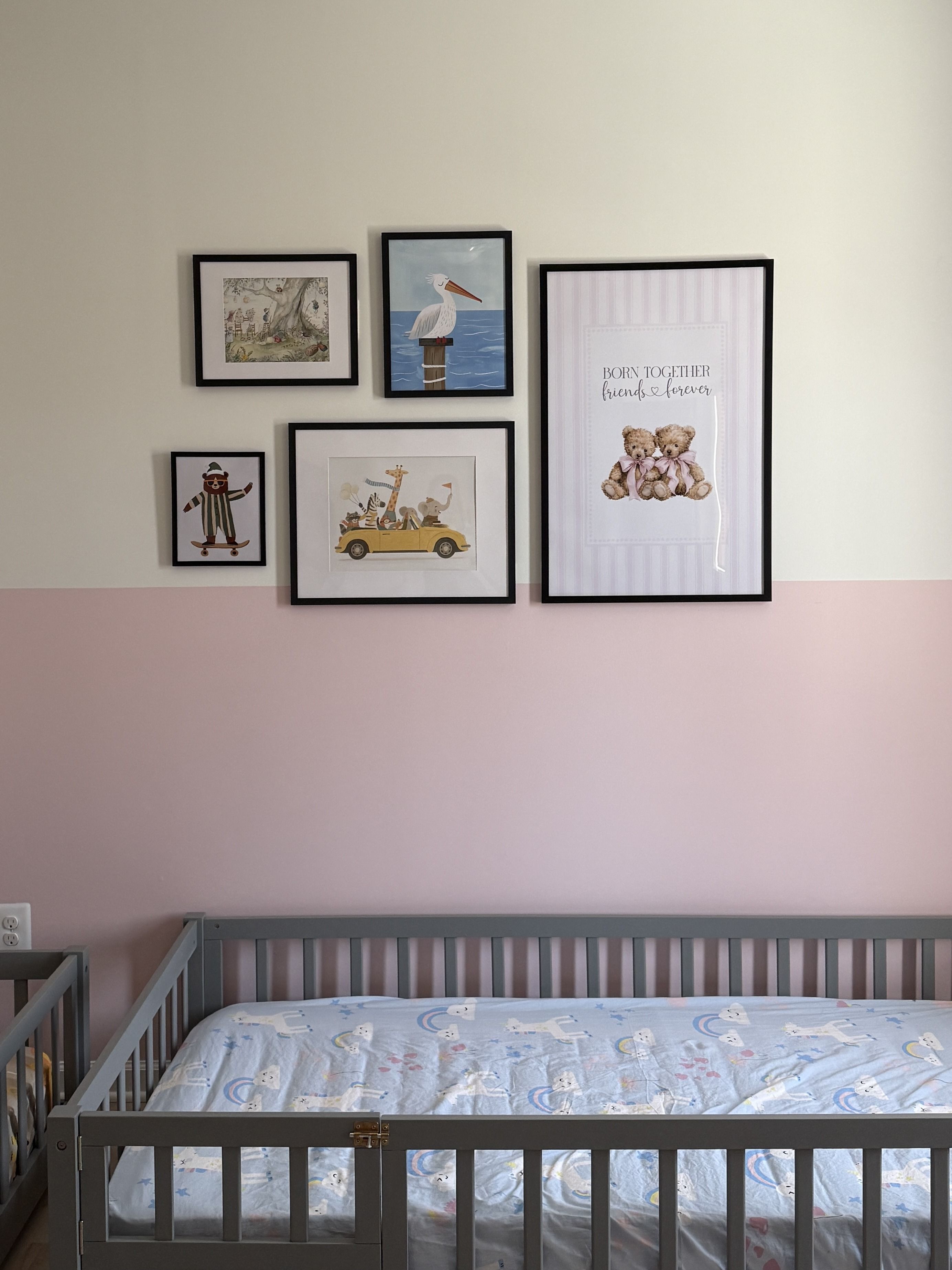 Baby girls nursery gallery wall with two-tone white and pink wall paint styled by Pragya Saikia Design in Aldie, Virginia